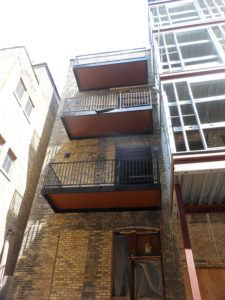 aluminum balconies retrofitted on 1800s building